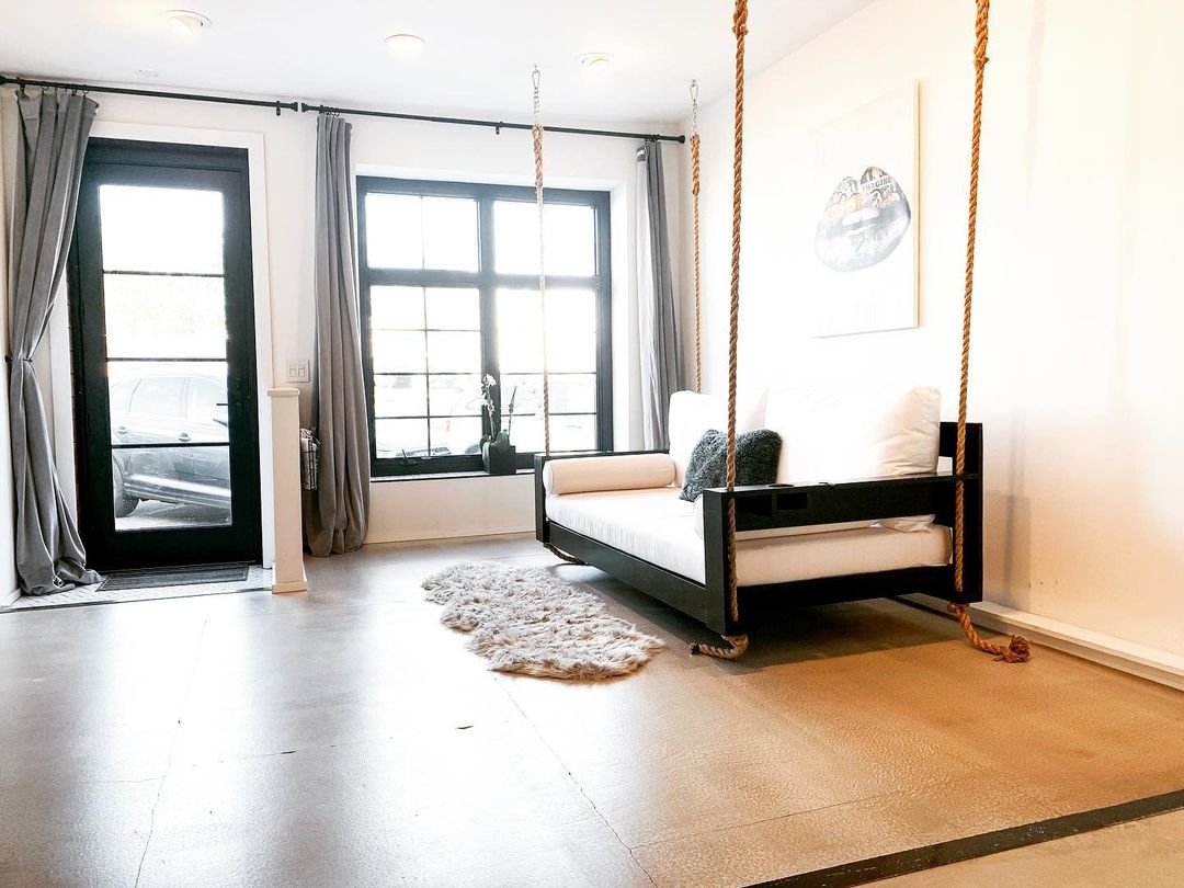 Swinging couches and concrete floors...YES please! ...